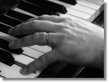 Image of a pianist's hand used to illustrate Lynn Houghton's specialism in the prevention of injury to musician's hands in the Doncaster, Retford and Worksop areas.